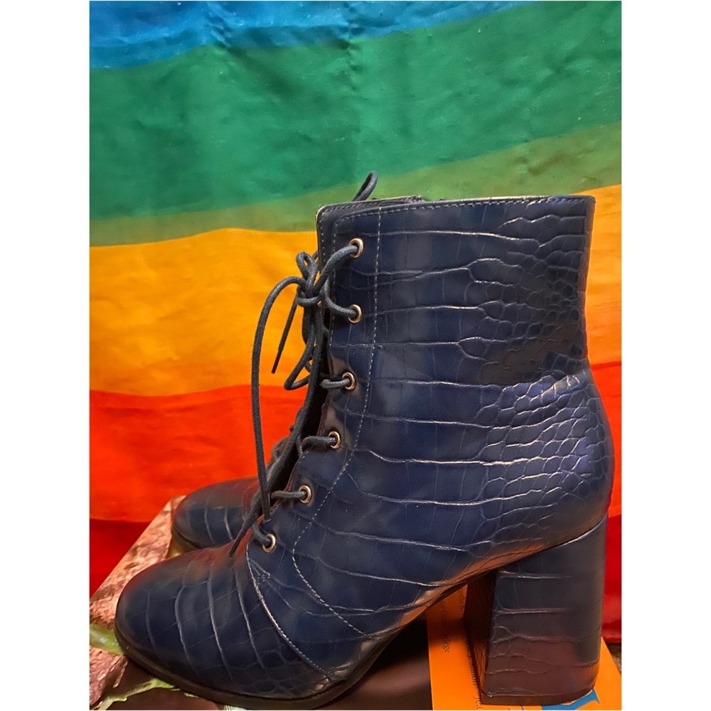 Crocodile print heeled boots